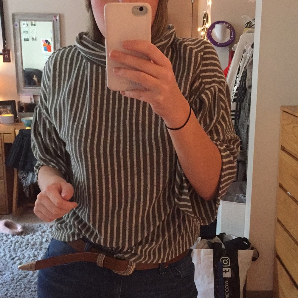 Turtle neck striped sweater.